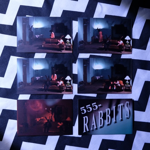 The Rabbits card set. They are all stills from the Rabbits film. Bottom left is the rare prize card, bottom right is the other side of the cards with the number.